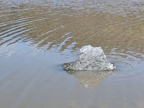 Ice on still water
